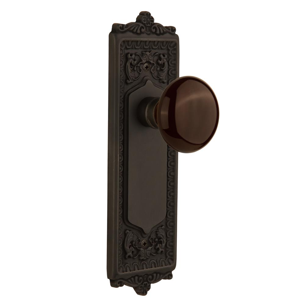 Nostalgic Warehouse EADBRN Passage Knob Egg and Dart Plate with Brown Porcelain Knob without Keyhole in Oil Rubbed Bronze